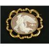 A Victorian shell cameo oval brooch, depicting Night carrying two children with an owl in the backgr