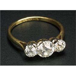 A diamond three stone ring, the Edwardian-cut stones approx. 0.32, 0.95 & 0.35cts (1.62cts total), c