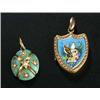 A late 19th century Swiss enamelled shield shaped locket, the front polychrome enamelled with a pair
