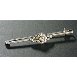 A small old-cut diamond cluster and twin trefoil, later applied to a square section bar(see illustra