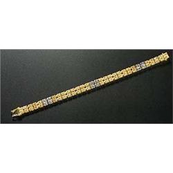 A square section bi-colour byzantine link two row bracelet on push snap, stamped 'Kast' and '750', 3