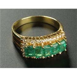 An emerald and diamond dress ring, centred with a band of five square emeralds within a small round.