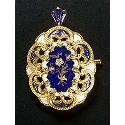 An Italian diamond and enamel shaped oval pendant/brooch, centred with a royal blue guilloche enamel