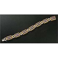 An Italian diamond and enamel bracelet of seven rectangular links each centred with a royal blue gui