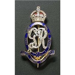 Royal Horse Artillery, a diamond and blue enamel regimental badge brooch, the central openwork GR cy