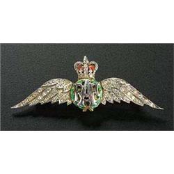 A 9ct white gold, enamel and diamond 'RAF wings' brooch, Birmingham 1987(see illustration)...