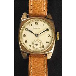 Rolex, a gentleman's 9ct gold cushion shaped wristwatch, circa 1938, the silvered dial with raised A