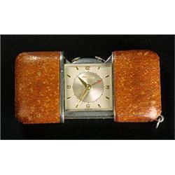 Movado, a stainless steel purse watch with alarm, circa 1950, no.900767, with leather mounted slide-
