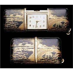 Movado, Ermeto, a Swiss 9ct gold and Japanese lacquer purse watch, the sliding covers decorated in h