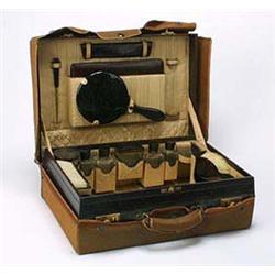 A lady's brown morocco dressing case with initials 'E.B.H.J' stamped 'Mappin & Webb Ltd, Oxford St L