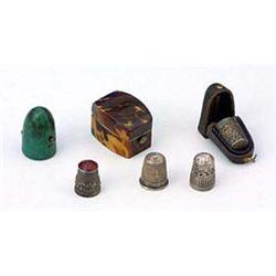 A collection of thimbles and thimble cases, comprising; an oblong tortoiseshell and ivory mounted th