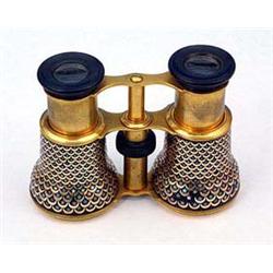 A late 19th century brass and tortoiseshell pique covered opera glasses, 11 cm wide (4 1/4 in)(see i