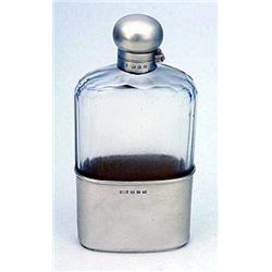 A glass and silver mounted spirit flask, Birmingham 1896, the makers mark mis-struck, 17 cm high (6.