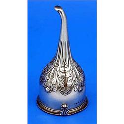 A late George III wine funnel with crest and leaf clip, a gadrooned border and embossed with acanthu