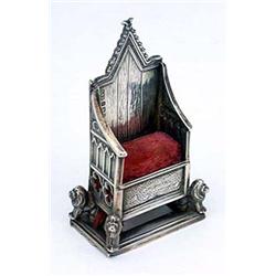 A pin cushion in the form of the coronation throne, Birmingham 1901 by Levi and Salaman, 7 cm high (
