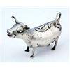 A cow creamer, the head with ruby-glass eyes, the hinged cover with engraved flowers and a fly finia