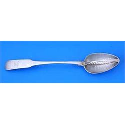 A George III Irish fiddle pattern straining spoon, engraved with a crest, the bowl with a pierced di