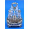 Image 1 : A Victorian oblong five bottle cruet stand, embossed with flowers, scrolls, diaper and cartouches wi
