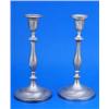 Image 1 : A pair of William IV round candlesticks, the vase shaped capitals, baluster stems and round bases wi