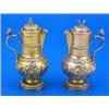 Image 1 : A pair of silver gilt baluster shaped Water & Wine cruets, embossed with winged putti and leaf scrol