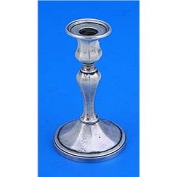 A Victorian taper stick with octagonal vase shaped capital and baluster stem on round base, London 1