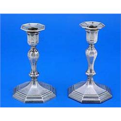 A pair of Victorian octagonal candlesticks with vase shaped capitals and baluster stems, Sheffield 1