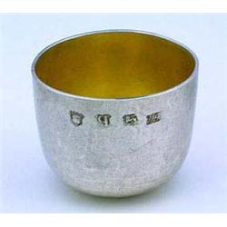 A late George II tumbler cup with a crest, London 1751 by John Payne, 5.25 cm (2 in)(see illustratio