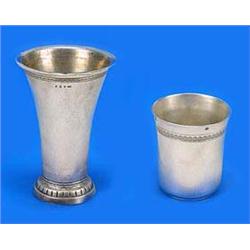 A German tall tapering beaker, with flat rim, a small moulded band on stepped and engraved foot, , i