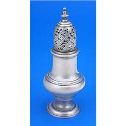 A George II baluster shaped caster, with a moulded girdle and border, the pierced cover with knopped