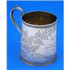 A Victorian straight sided christening mug with beaded borders and scroll handle, engraved with flow