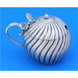 A Victorian spherical mustard pot, spirally fluted, the hinged cover with a fan shaped thumb piece,.