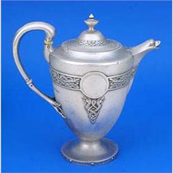A Scottish vase shaped coffee pot, the spout in the form of a birds head, with a leaf chased handle.