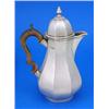 A late Victorian facetted baluster shaped hot water jug in George I style, with a wood handle, the d