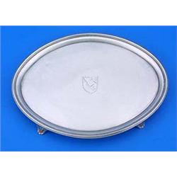 A George III small oval salver with a reeded border, bracket feet and engraved with an armorial, Lon