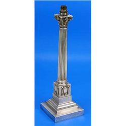 A Victorian candlestick with corinthian capital, fluted column and stepped square base inscribed 'Pr
