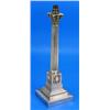 A Victorian candlestick with corinthian capital, fluted column and stepped square base inscribed 'Pr