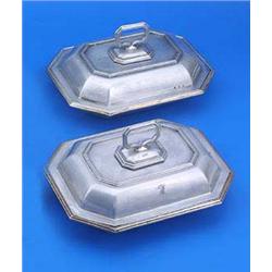 A pair of canted rectangular entree dishes, covers and handles each with moulded borders and engrave