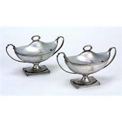 A pair of George III Sheffield oval boat shaped sauce tureens and covers, the domed covers with leaf