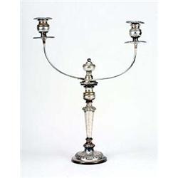 A pair of 19th century round candlesticks with flower chased borders and a pair of two branch candel