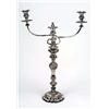 A pair of 19th century candlesticks and a pair of associated two branch candelabra arms, the shaped-