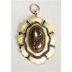 An unusual opal, ivory and enamelled pendant, of almost oval flowerform, with a central oval cabocho