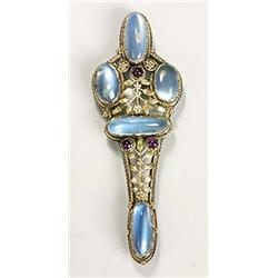 A large Arts and Crafts moonstone and amethyst brooch, the design attributed to John Paul Cooper, of