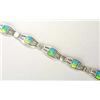 An enamelled silver bracelet, composed of five oval and openwork plaques, with central panels of blu