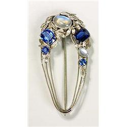 A Bernard Instone moonstone and gem-set oval brooch, decorated at on end with a cluster of moonstone