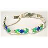 An enamelled silver bracelet, composed of five foliate plaques in green and yellow with deep blue ov