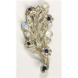 An Arts and Crafts moonstone and sapphire brooch, possibly by Bernard Instone, formed as a floral sp