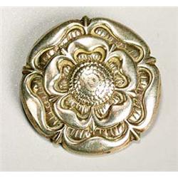 A Bernard Instone brooch, cast in the form of a Tudor rose, 4cm. diam., marked 'Silver' and 'BI'** a