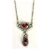 An Arts and Crafts garnet necklace, possibly by the Gaskins, with an oval almandine garnet cabochon.