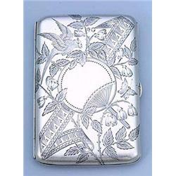 An 'Aesthetic Movement' silver card case, of rectangular shape engraved on the front with an Orienta
