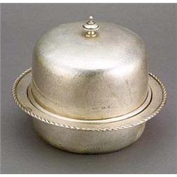 An A.E. Jones silver muffin dish and cover, the deep base having an everted rim edged with ropework.